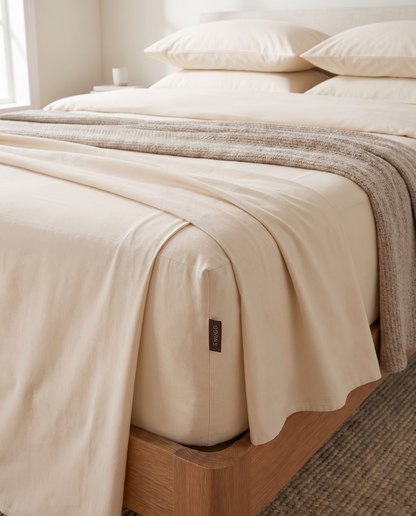 SNUGG Warm Ivory Full Set styled on bed